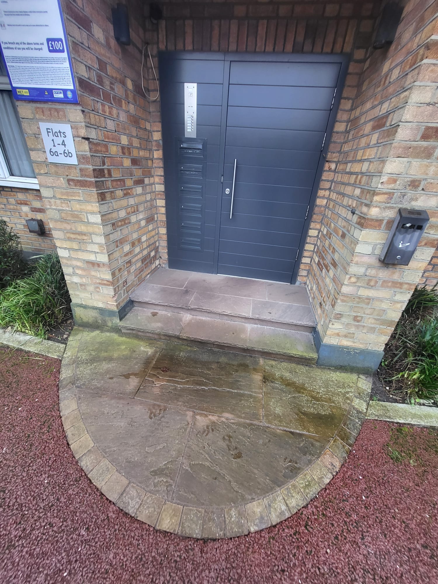 Patio pressure washing in progress