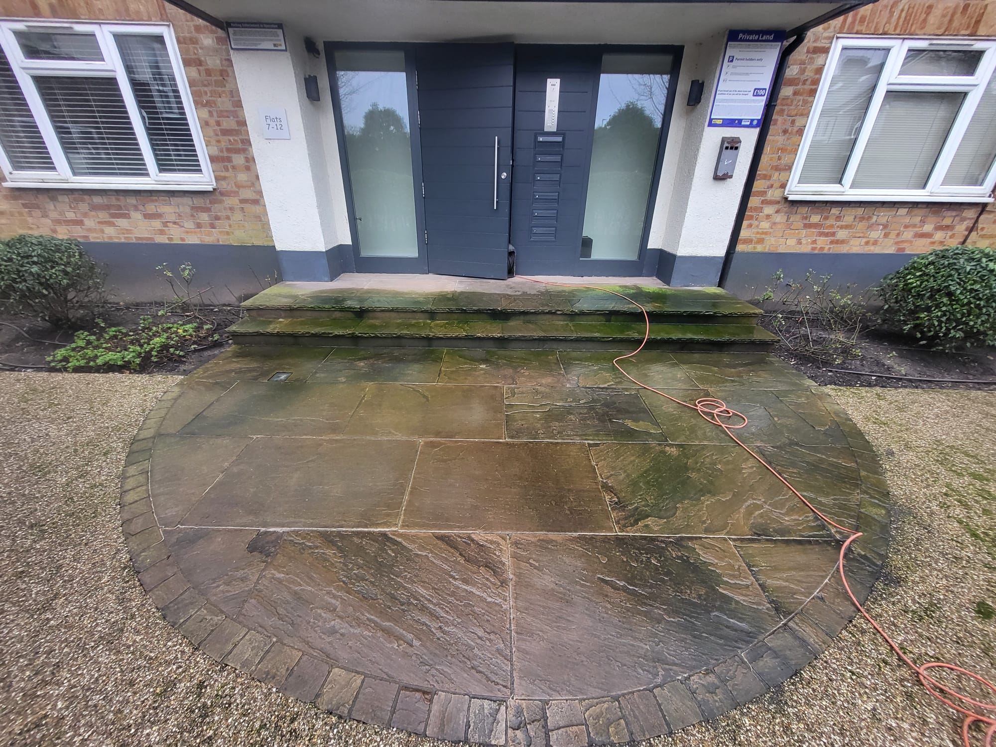 Restoring colour to paving slabs