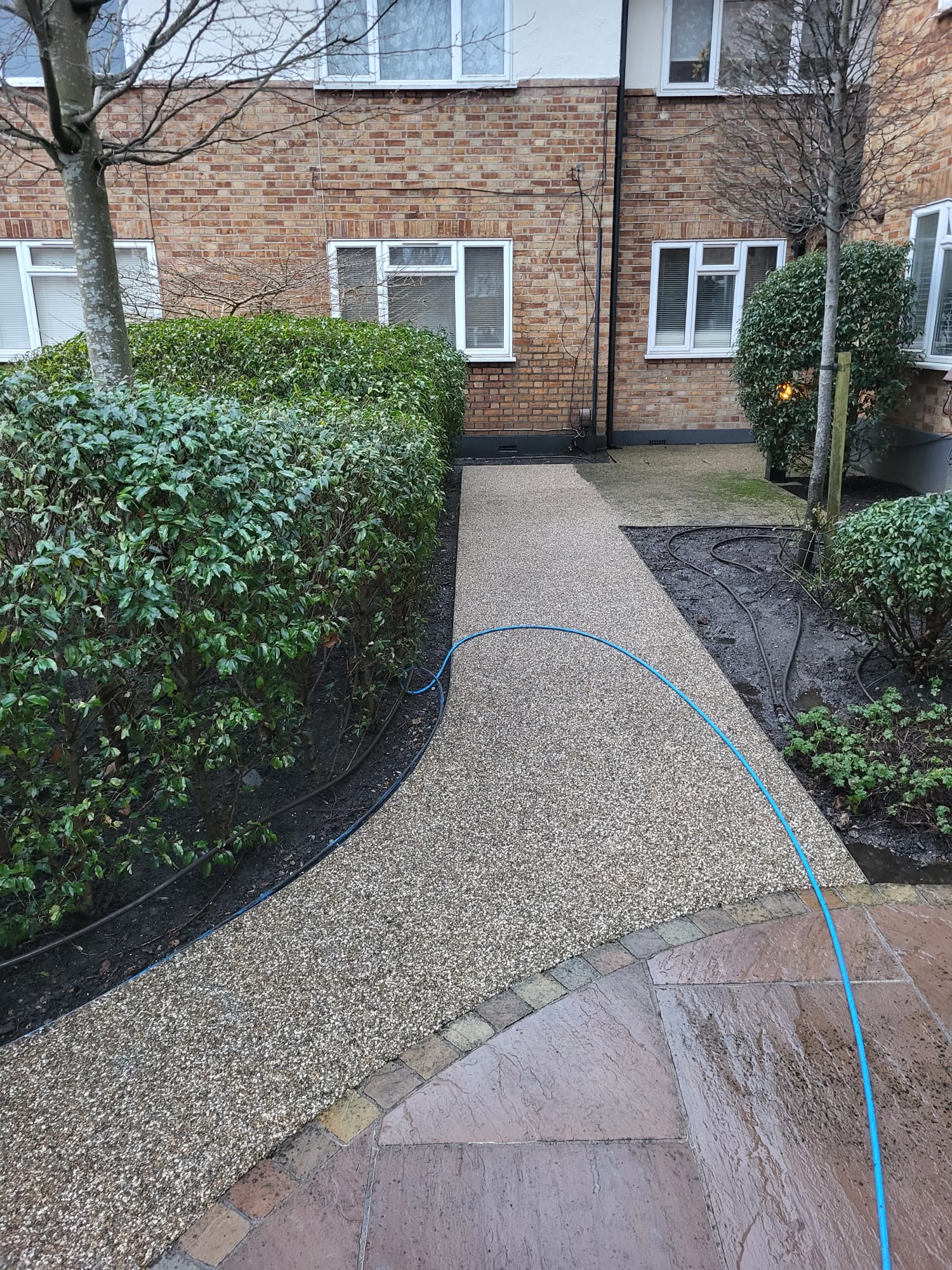 Driveway after pressure washing